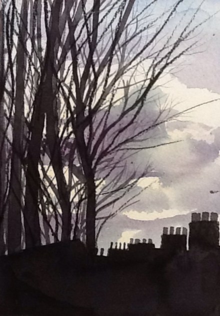 Trees and stacks and a February sky